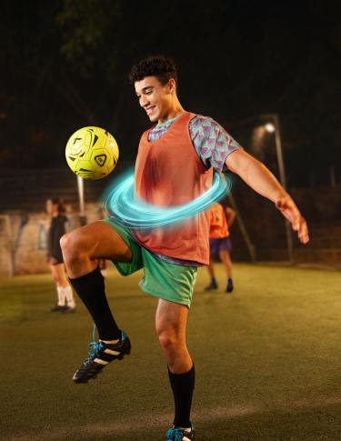 Man juggling soccer ball