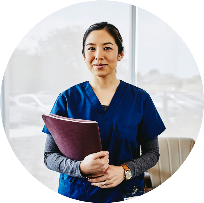 Female Healthcare Professional holding documents