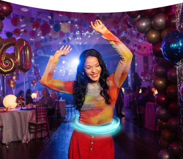 Female ulcerative colitis (UC) TREMFYA® patient dancing and having fun at her 60th birthday party