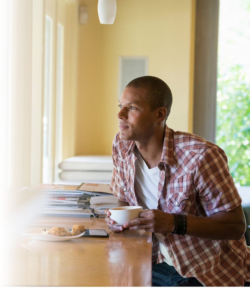 Man with guitar hiking with woman