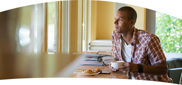 Man with guitar hiking with woman
